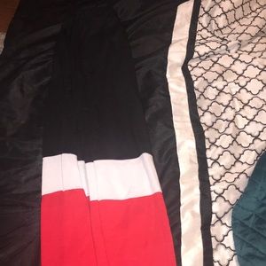 Red, black, and white joggers